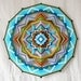 Finding Love, an 18 inch, 12-sided, Ojo de Dios, by custom order