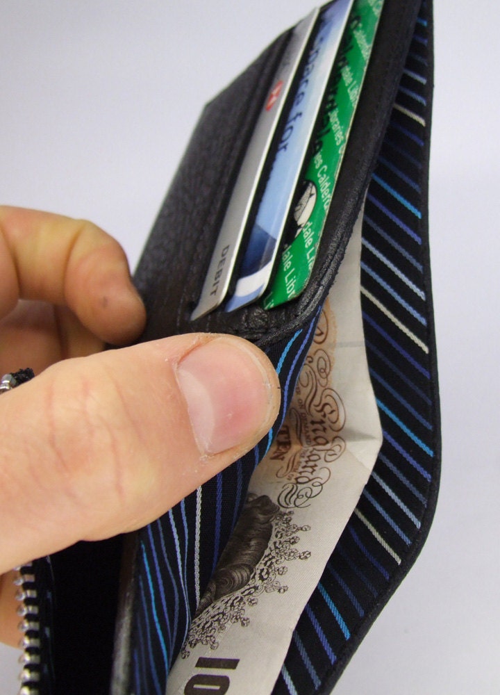 Black leather wallet with striped blue lining