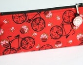 Zipper makeup pencil case black bycicles  on red background
