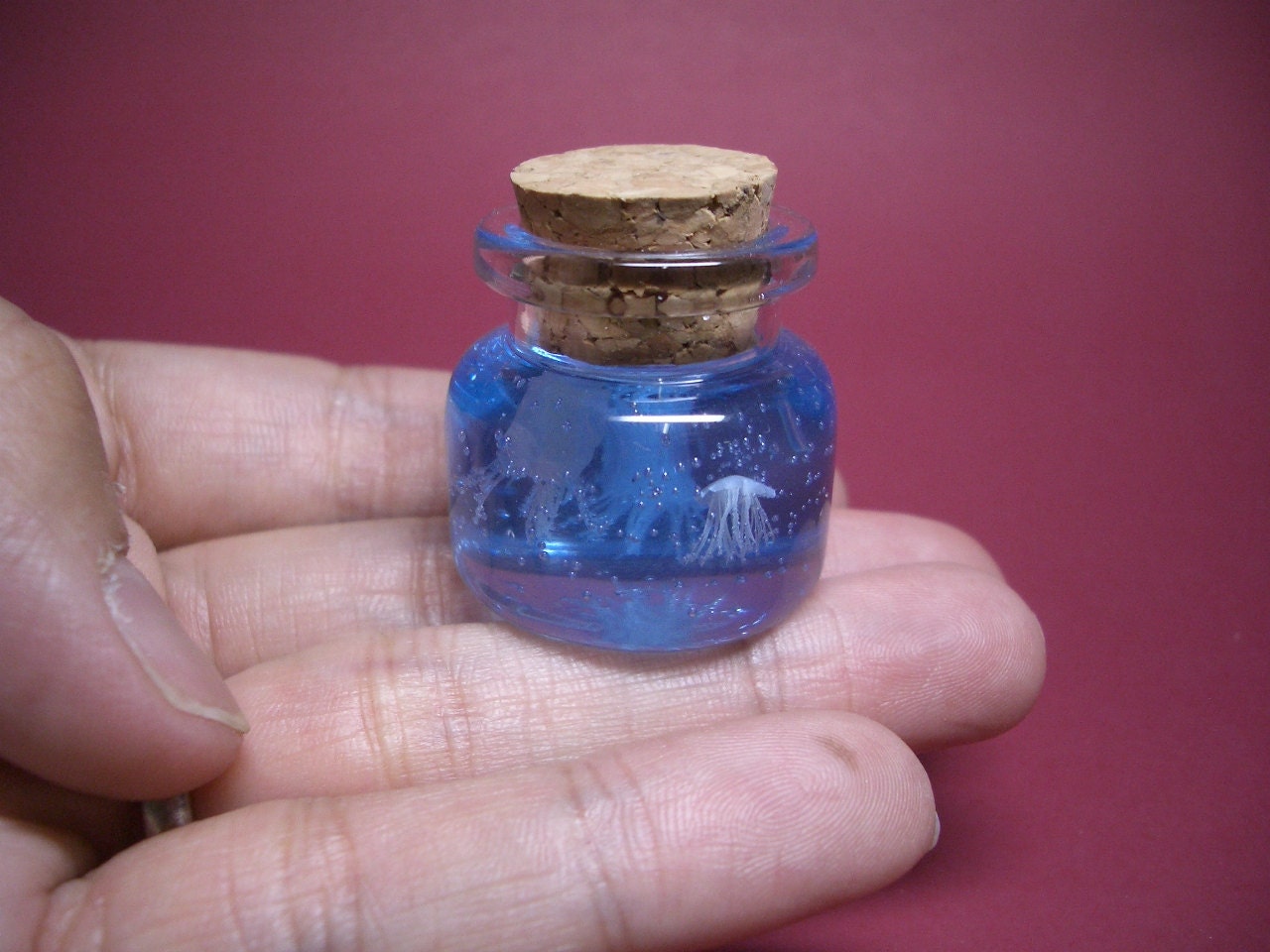 Tiny jellyfish in a tiny bottle