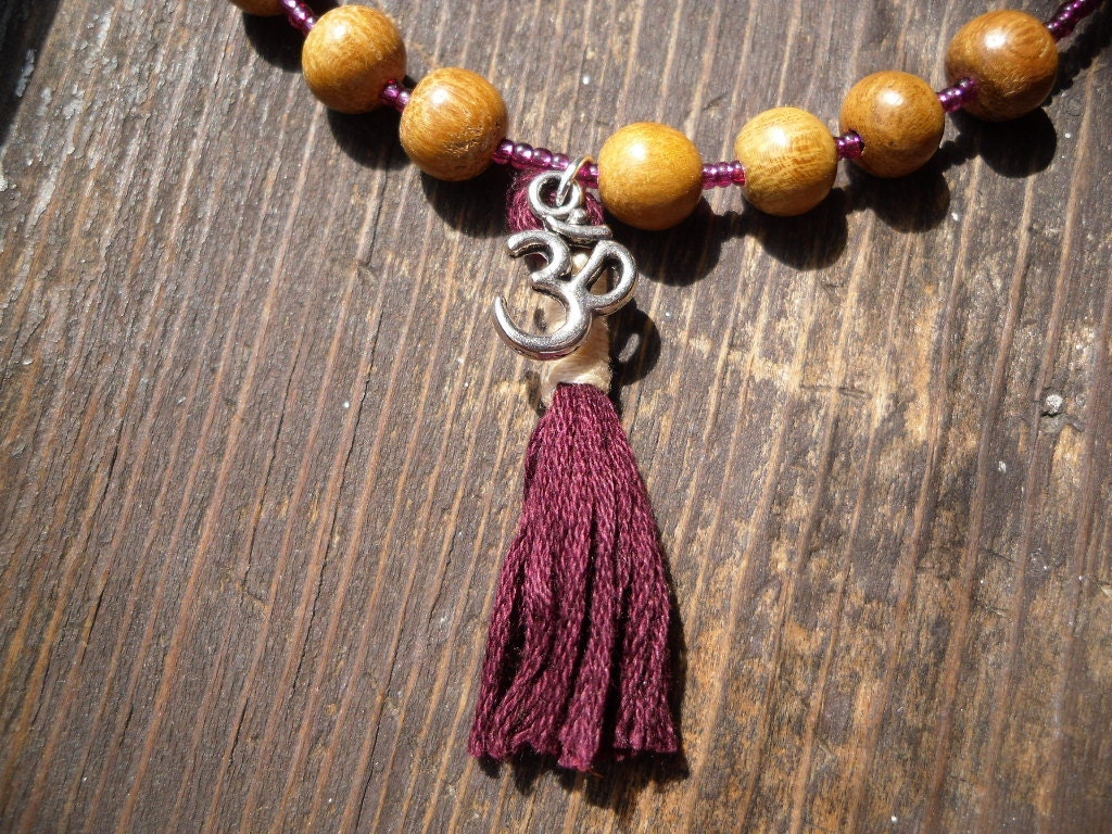 Om Tassel/Meditation/Yoga/Buddhism/Hinduism/Dharma Charm Necklace by TheReflectivePause.etsy.com