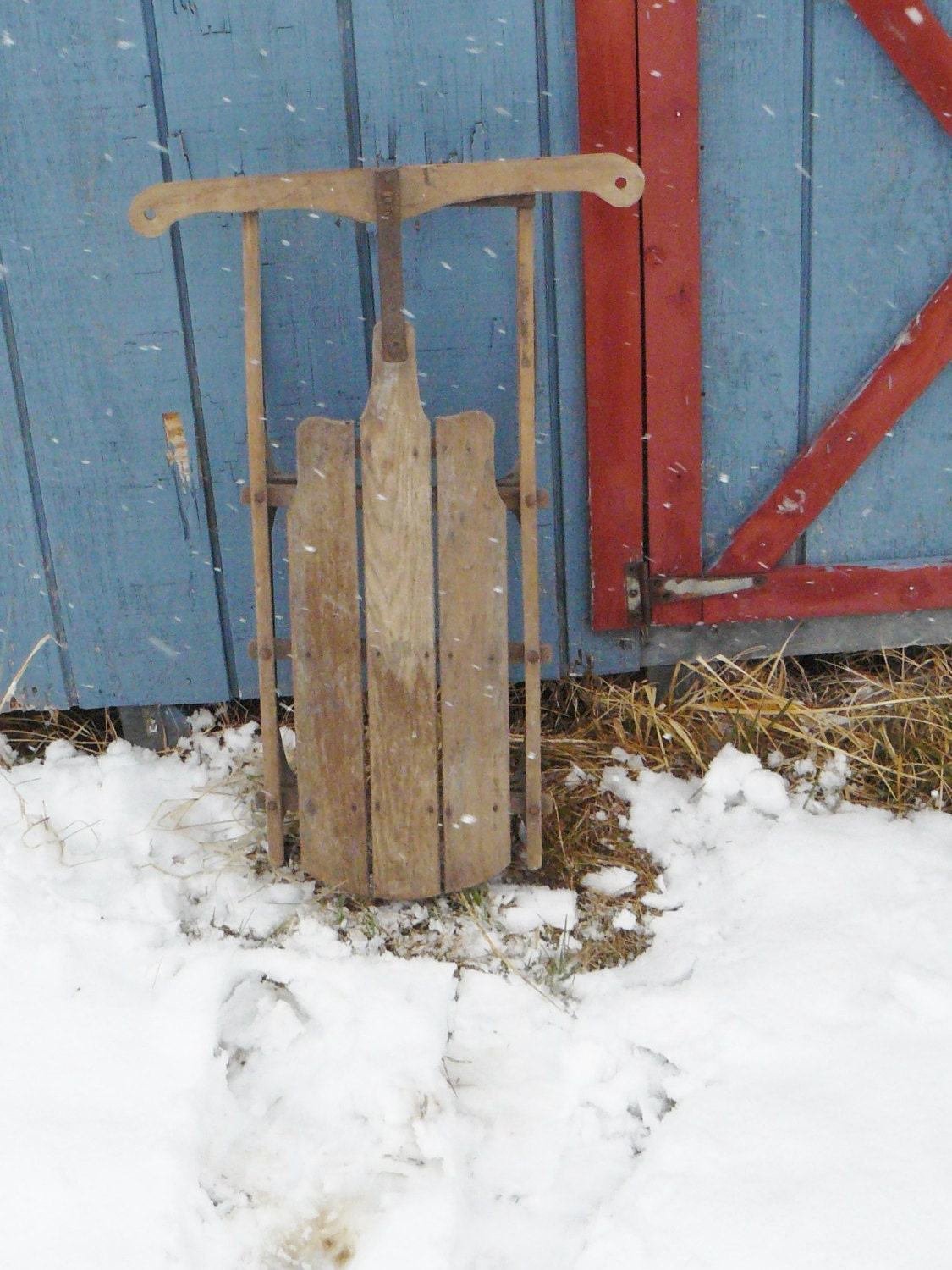 vintage wood sled with metal runners