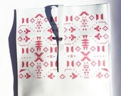 Printed Leather Clutch for Woman with pink geometric tribal native graphic design fold and pop closure
