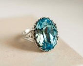 Swarovski Crystal Ring - Aquamarine -  oval cabochon - silver tone base - water shade