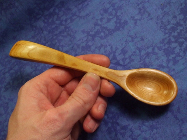 Hand carved eating spoon in curly cherry wood ( Special Price)