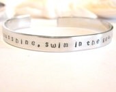 Live in the Sunshine, Swim in the Sea, Drink the Wild Air Hand Stamped Bracelet Stock No L134
