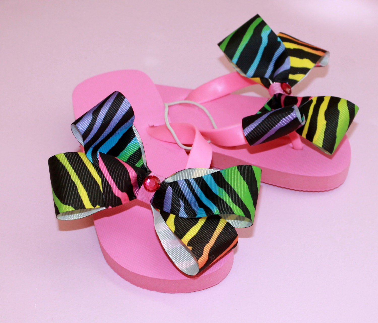 Rainbow Zebra Oversize Bow Flip Flops