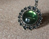 Antique Bronze Pendant with Olive Green Acrylic Cabochon on a Bronze Chain