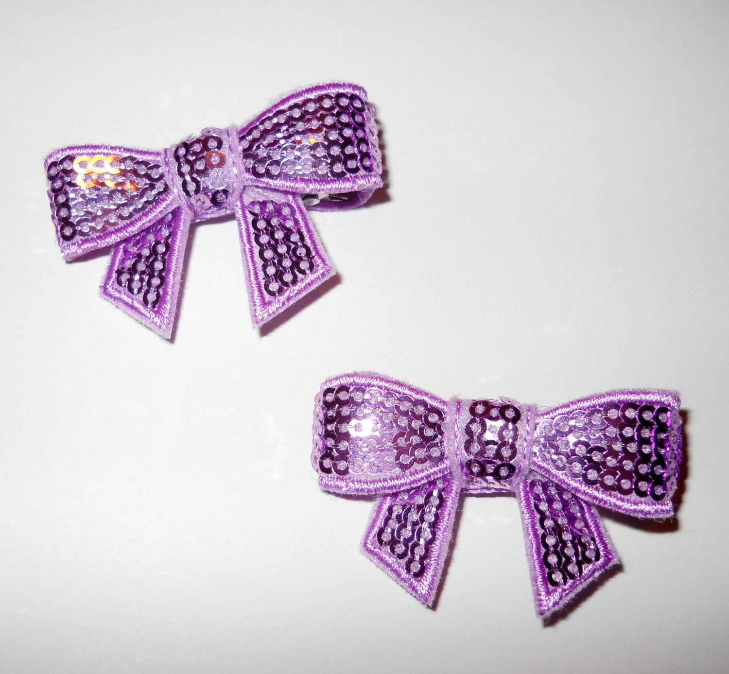 Set of Two (2) Lavender Sequin Bow Ribbon Lined Alligator Clips
