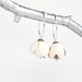 Flower leather earrings in milky white
