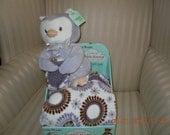Purple owl toy with matching purple blanket