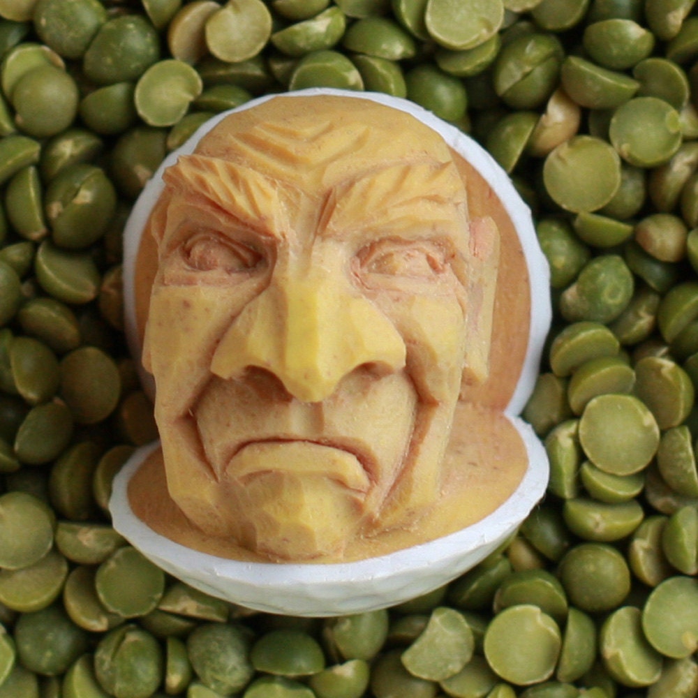 Hand Carved Golf Ball with a Scowl