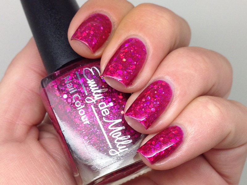 Nail polish - "Fashion Victim" pink holographic glitter in a pink jelly base