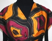 Hand Painted Silk Scarf Casablanca Lights. Scarf in Burgundy, Golden Orange, Black. Size 11x60. Made in Colorado. 100% silk. MADE TO ORDER.