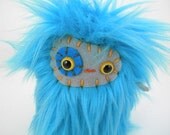 Li the plush monster miniature teal blue and grey stuffed animal Little Uggle