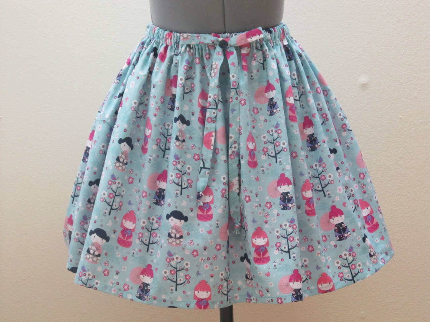 Womens Blue Japanese Dolls Skirt - Cute retro skirt- Full of twirl flounce- With a bow and button