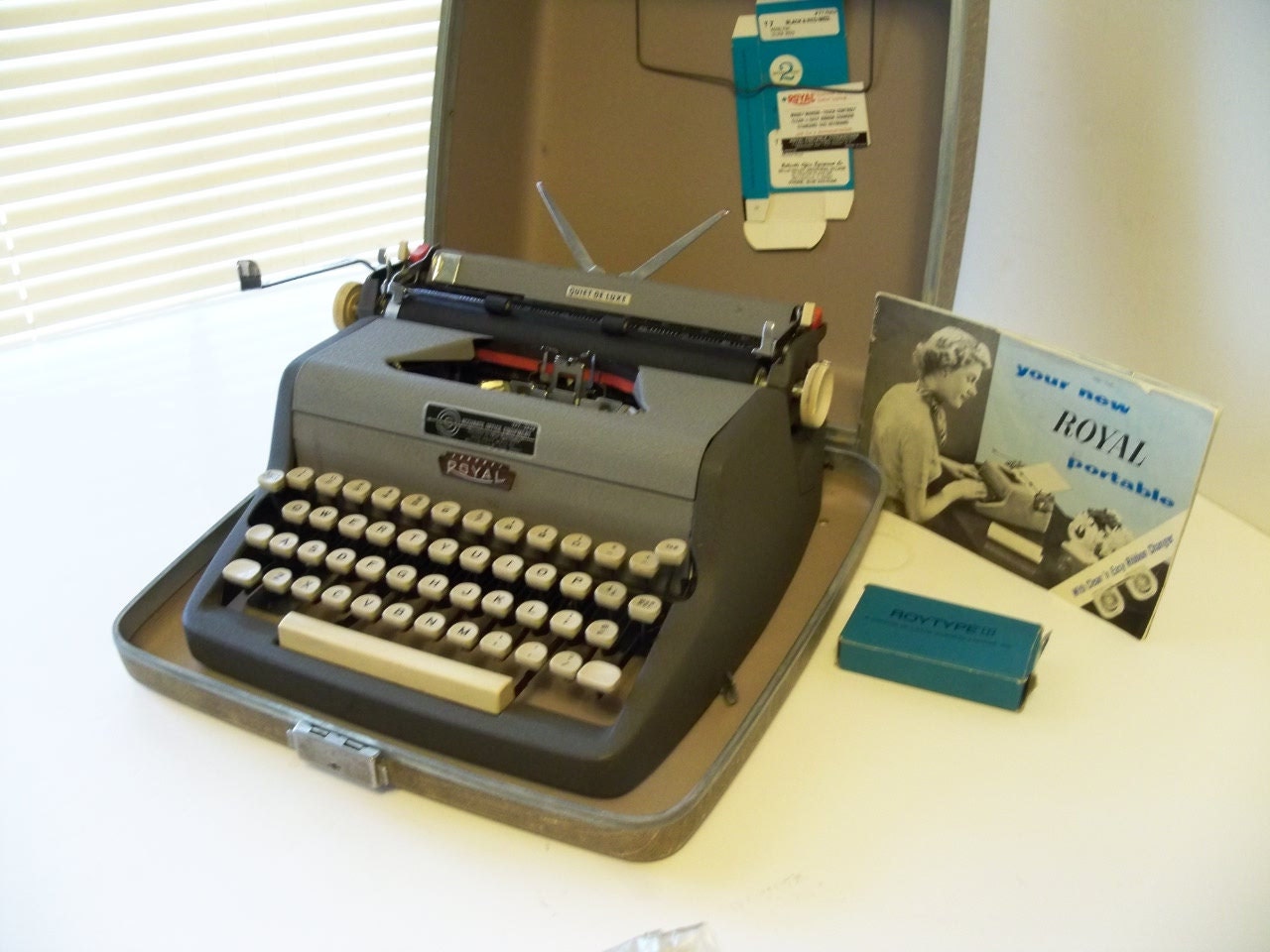 Royal Quiet DeLuxe Typewriter Portable with case cover and owners manual