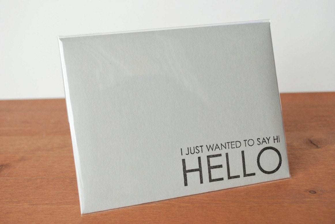 light grey envelope single: hi hello