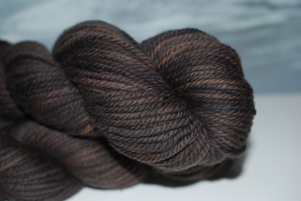 Dark Chocolate Caramel:  Black Hawk Bulky, SW Merino 243