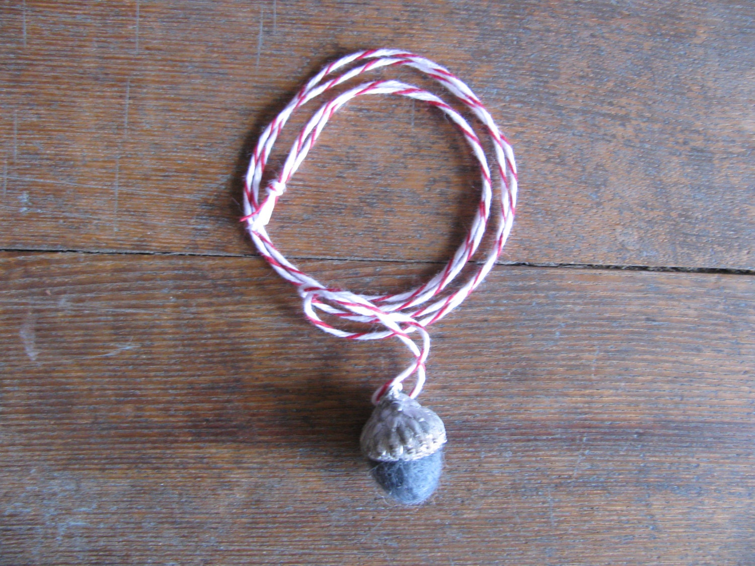 Felted wool acorn pendant necklace, slate blue with metallic silver-colored cap