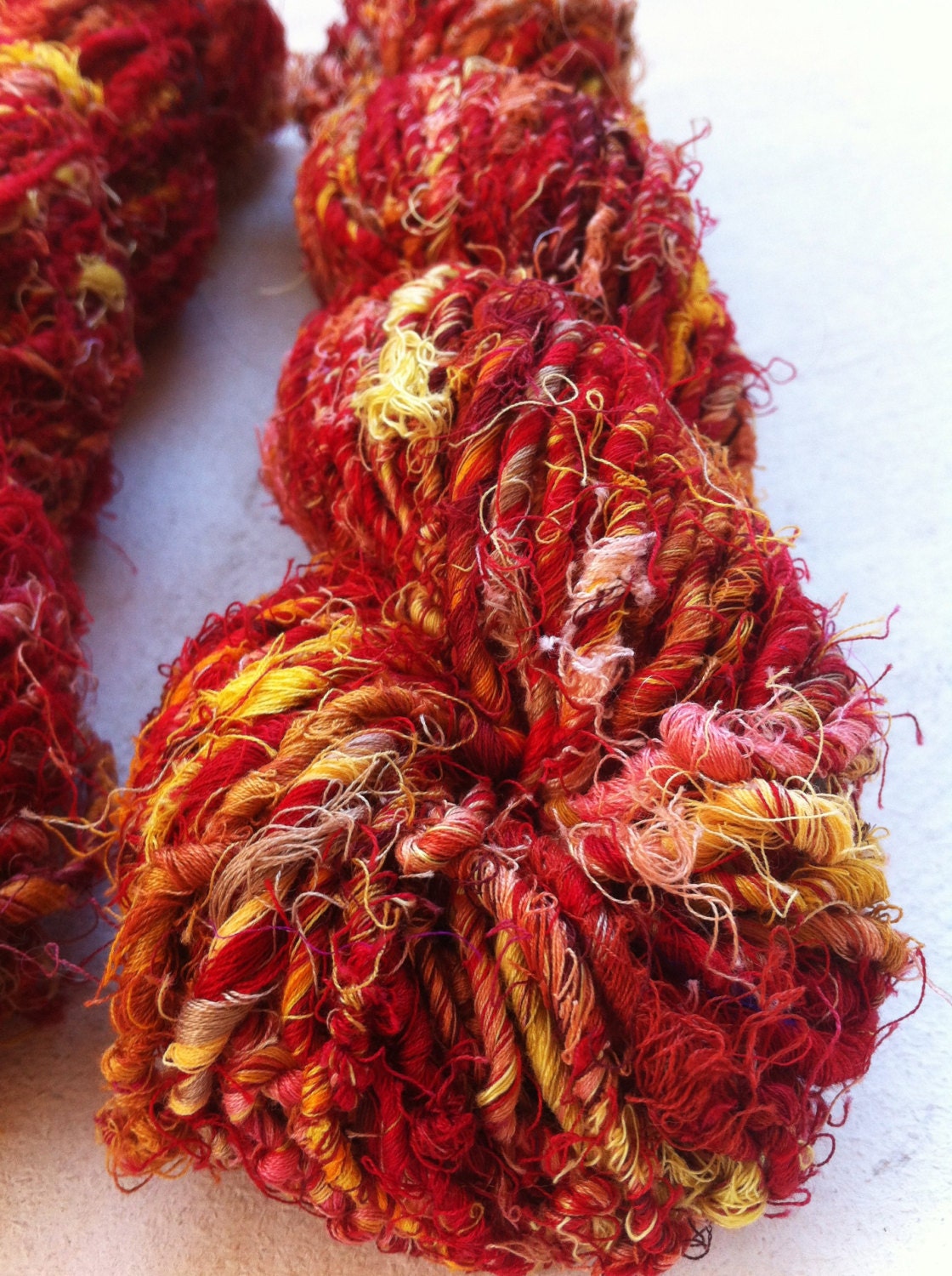 Recycled sari cotton yarn. Handspun cotton yarn. At Yarn. 2 x 100 grams. Sunset. Knitting yarn. Art yarn. Yarn supplies
