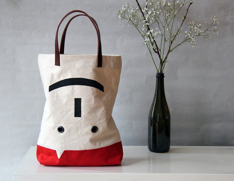 Lachende canvas boodschappentas