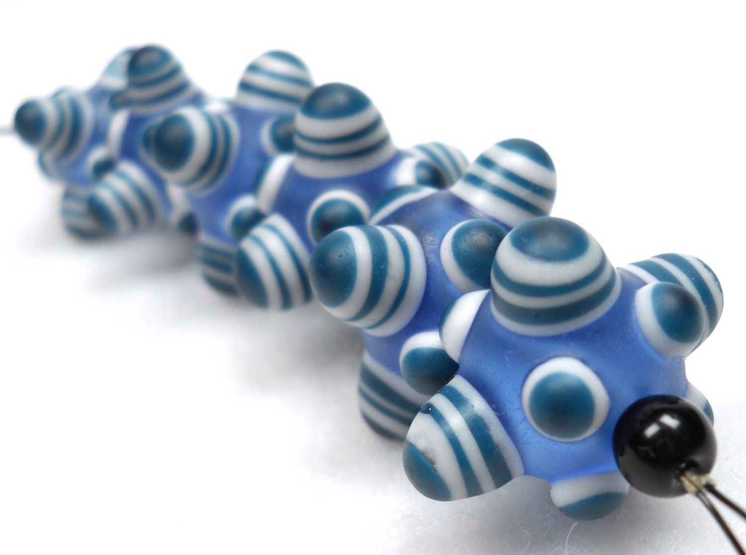American Trade Bead - Connecticut - Strand of 6 marble beads. Solid boro glass lampwork.