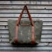 Waxed canvas bag/ carry all with  leather handles and zipper closure  COLLECTION UNISEX