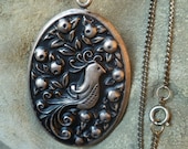 Silver Bird Pendant Necklace Ornament. International Sterling. Repousse. Vintage 1970s.