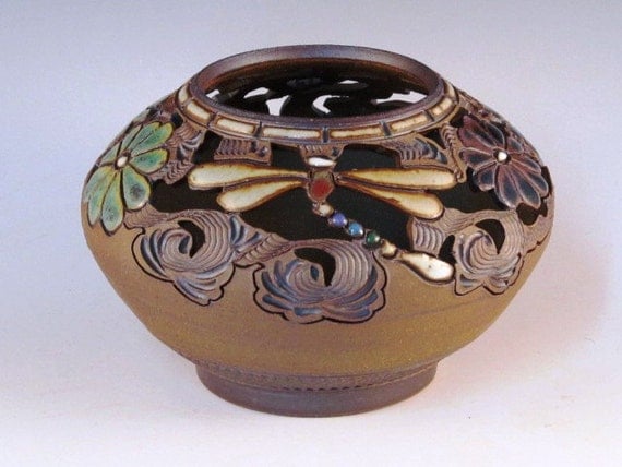 Round Vase With Dragonflies, Flowers, Swirl Design, And Cutouts With Texturing Near Bottom