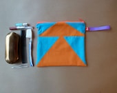 Zippered, hanging toiletry kit, cosmetics bag.  Orange, Turquoise, Neon Red Zipper Triangle Hipster Modern.