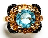 Sky blue topaz accent 18k yellow gold over sterling silver ring s 6  "Razz Ma Tazz"