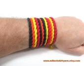 T Shirt Bracelet or Necklace - Repurposed Fashion - Black Red Orange Yellow Tshirt Yarn