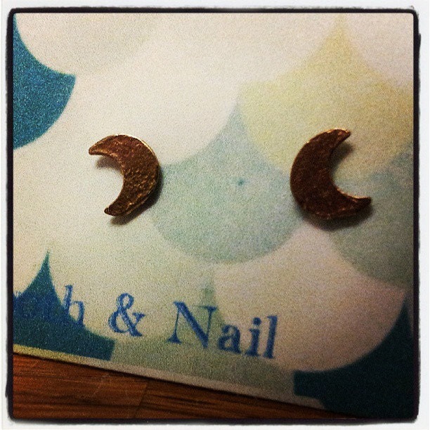Crescent moon earrings.