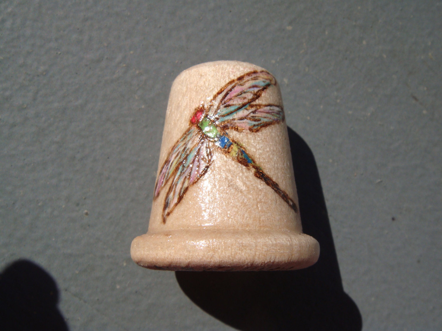 wooden thimble with woodburned dragonfly design