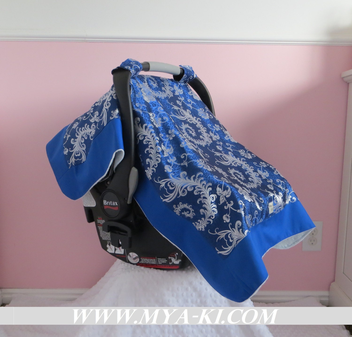 Infant Car Seat Cover with matching blanket with pacifier holder attached in Royal blue satin print and baby blue minky