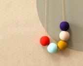 not quite round handmade beads make a necklace