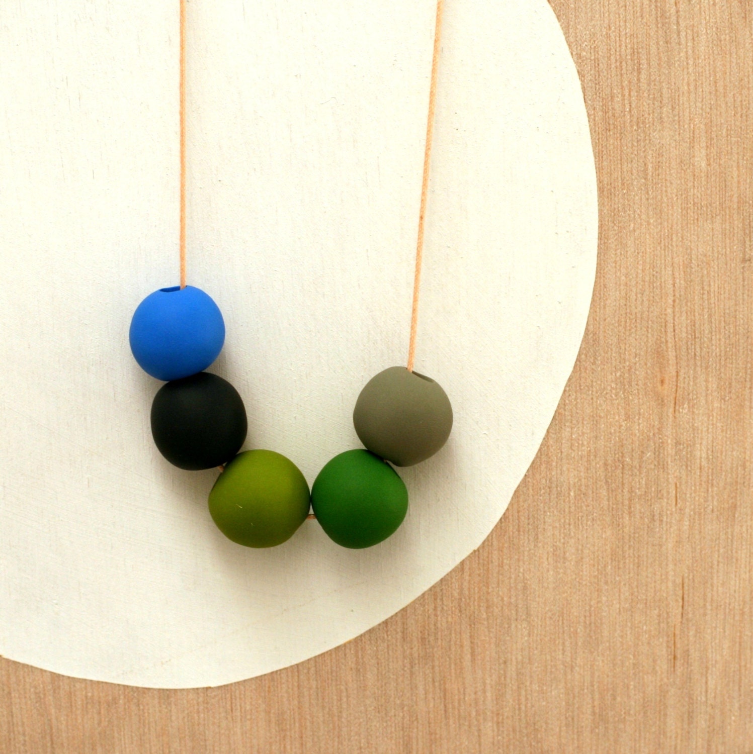 not quite round handmade beads make a necklace