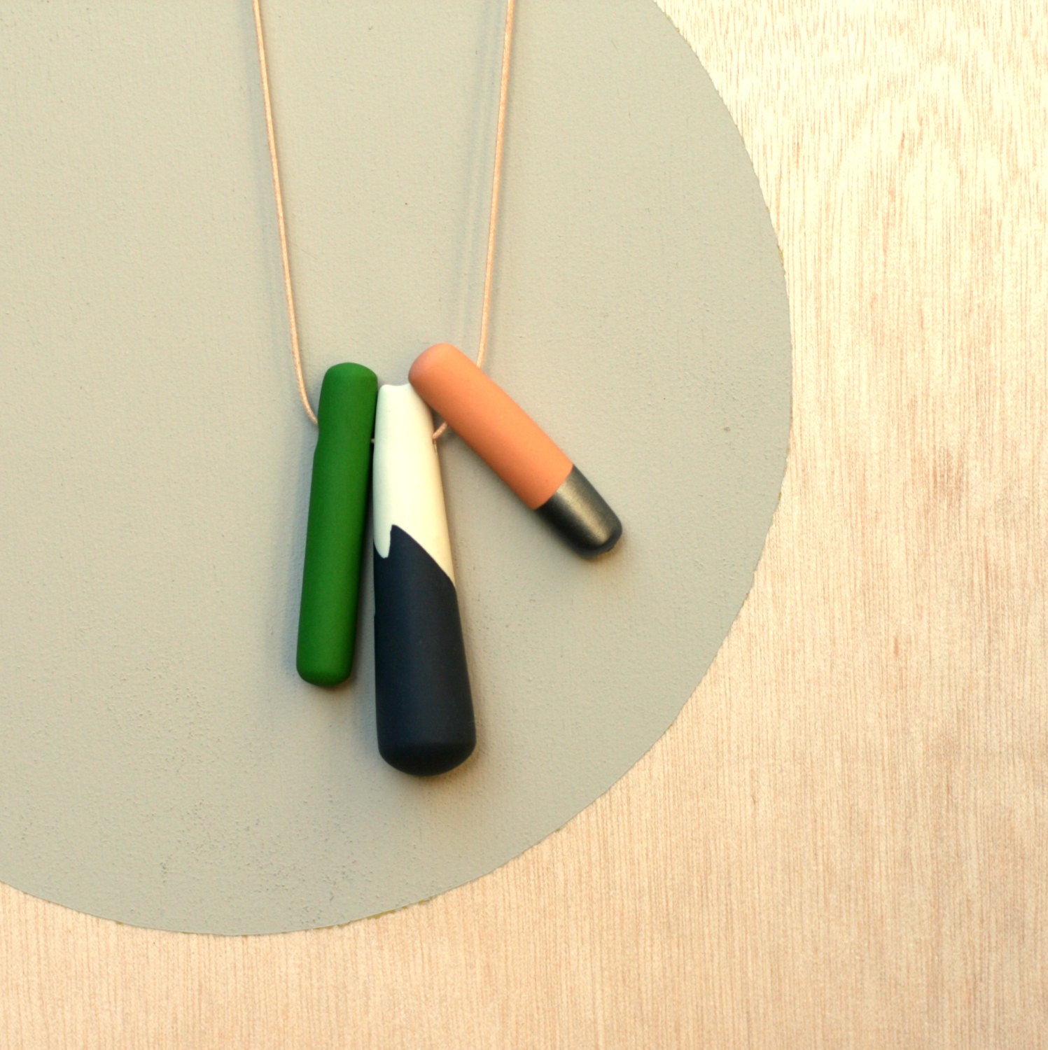 and a dip of pewter makes a necklace