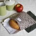 pair of reusable, lined sandwich bags in purple leaves & charcoal