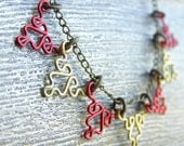 Fractal Necklace - Sierpinski Triangle Bunting in Red and Brass