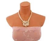 Heart shaped knotted necklace White bead crochet rope embellished with a metallic gold cord (hand sewn)