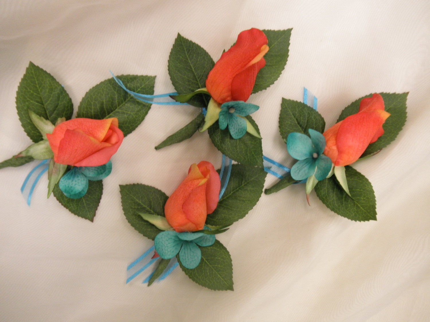 Set of (4) Wedding Boutonniere. Rosebud and hydrangea. Coral Guava Orange Turquoise Malibu Caribbean Blue