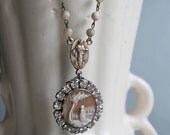 Vintage assemblage necklace old cameo rhinestones rosary chain assemblage jewelry - Simple Elegance by French Feather Designs.