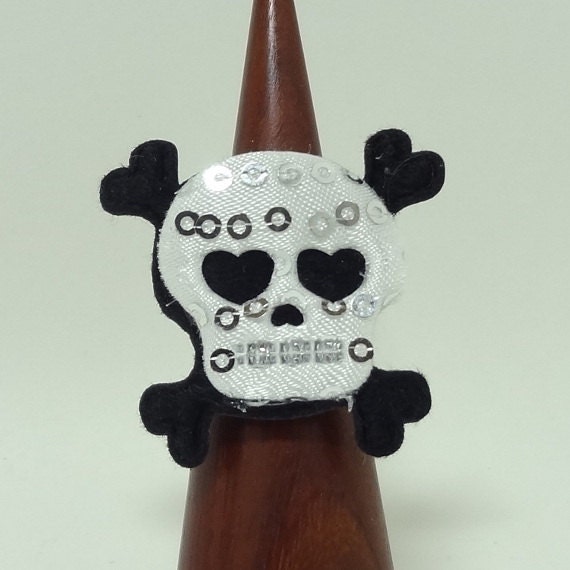 White Skull and Cross Bones Ring Set on a Silver Filigree Base With an Adjustable Band