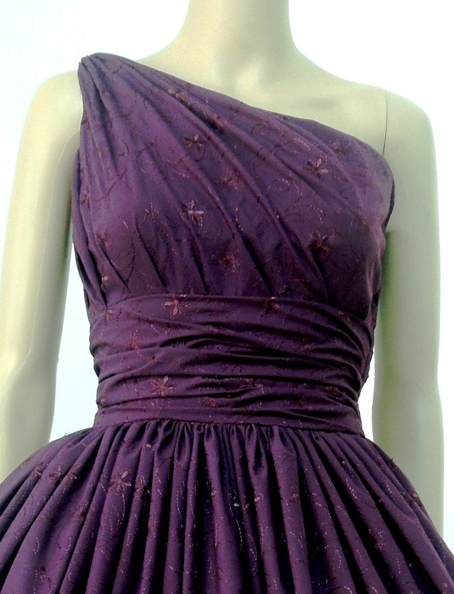 A cotton eyelet burgendy 50s dress