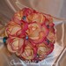 Shades of Coral Real Touch Roses Wedding Bouquet with Either Large or Smaller Teal Crystal Accents and Satin Hand Tied Stems.