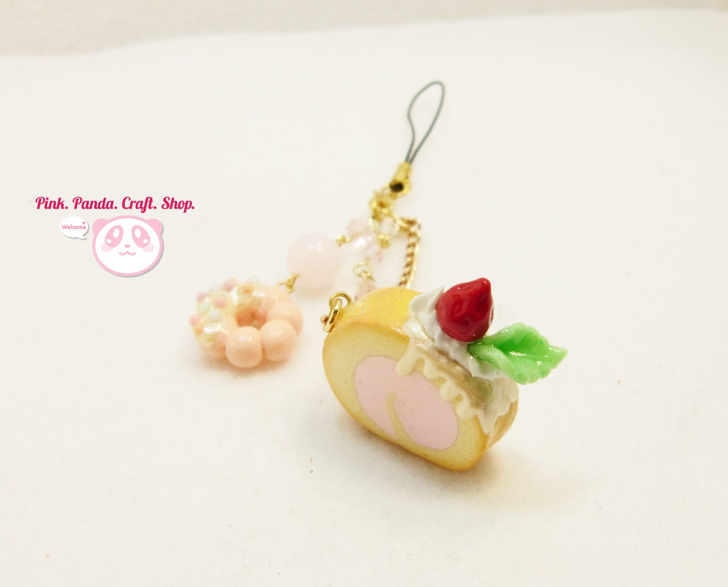 Polymer clay strawberry cake roll phone charm