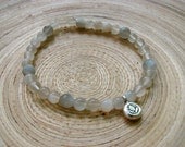 Tiny lotus and moonstone beaded bracelet with Hill Tribe fine silver / delicate stretch lotus bracelet
