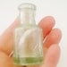 Old glass little ink bottle, antique from Archaeological dig, Edwardian era